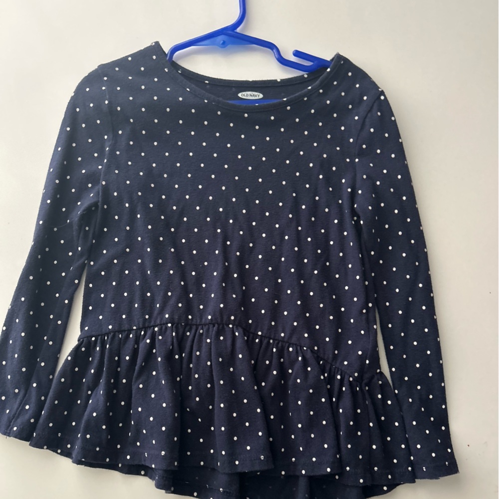 Old Navy Girls polka dot top with ruffle detail.